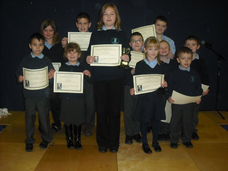 Endeavour Children show off their certificates