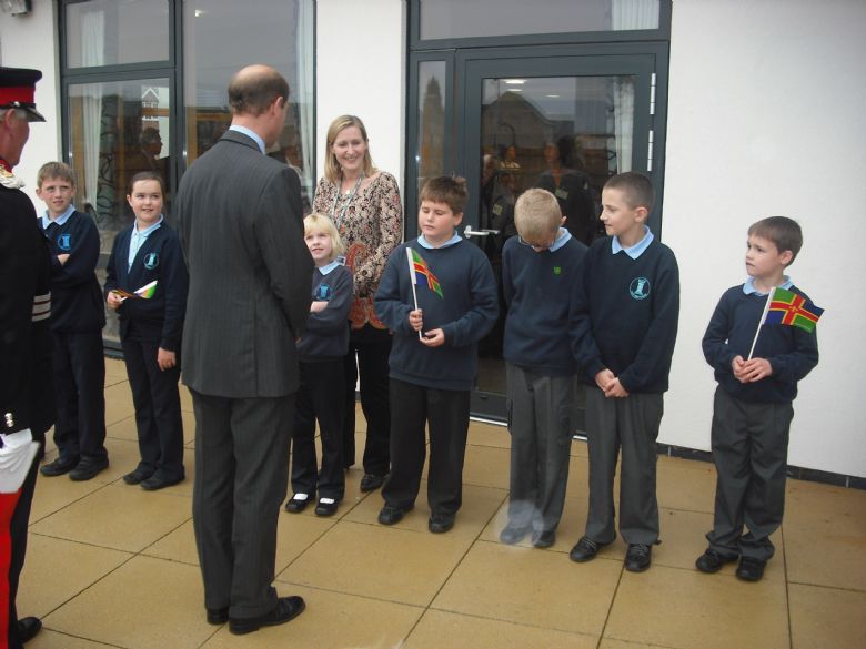 Prince Edward is greeted by Miss Harkins and our children