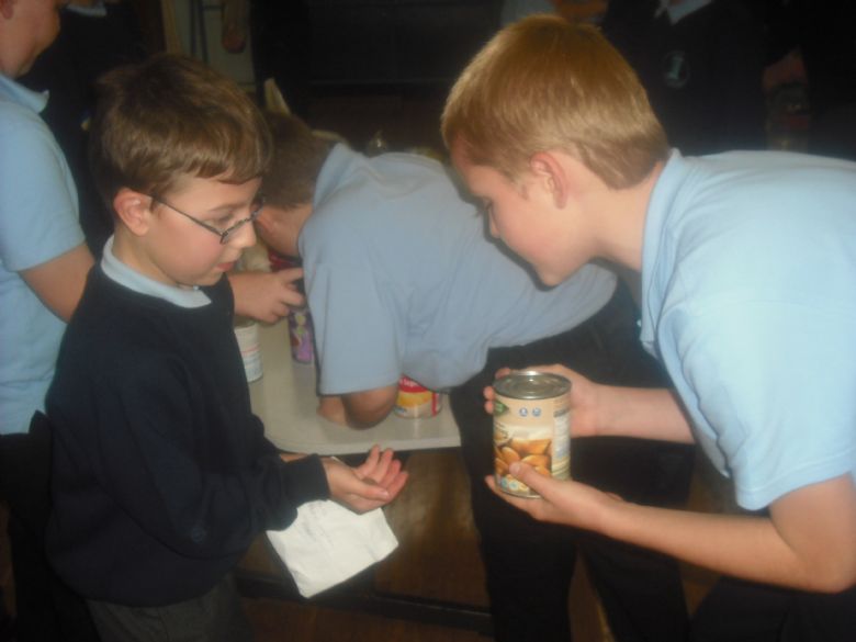 Philip helping one of the children from KS1 at the sale.